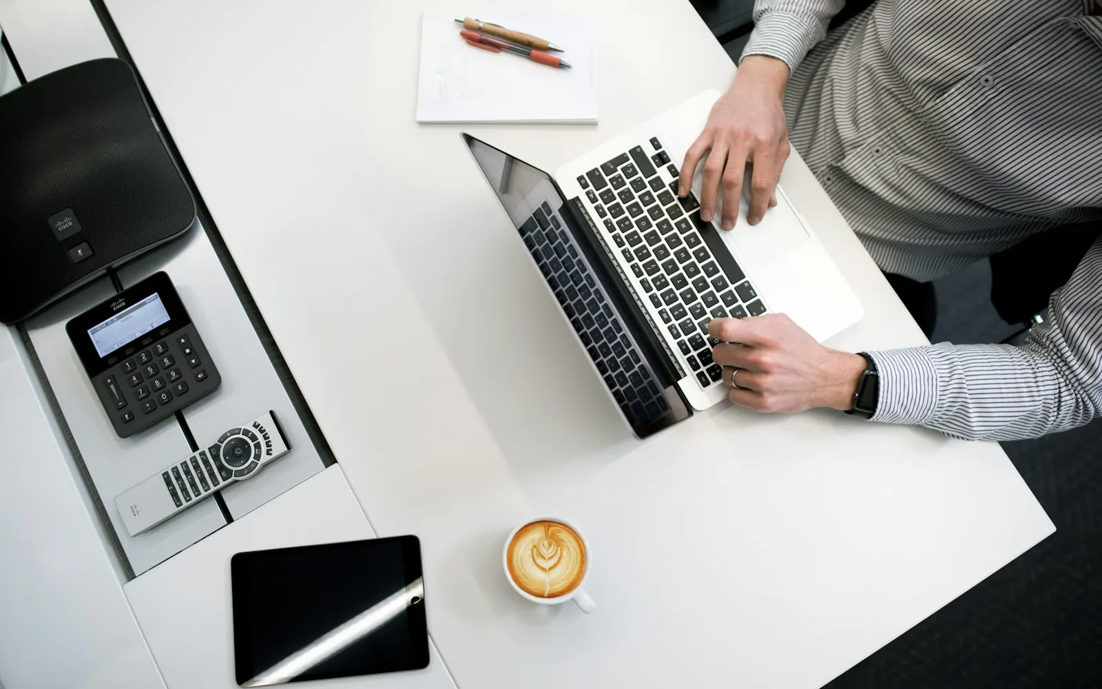 A person using a laptop for support services