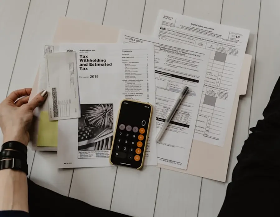 Financial planning documents on a writing desk